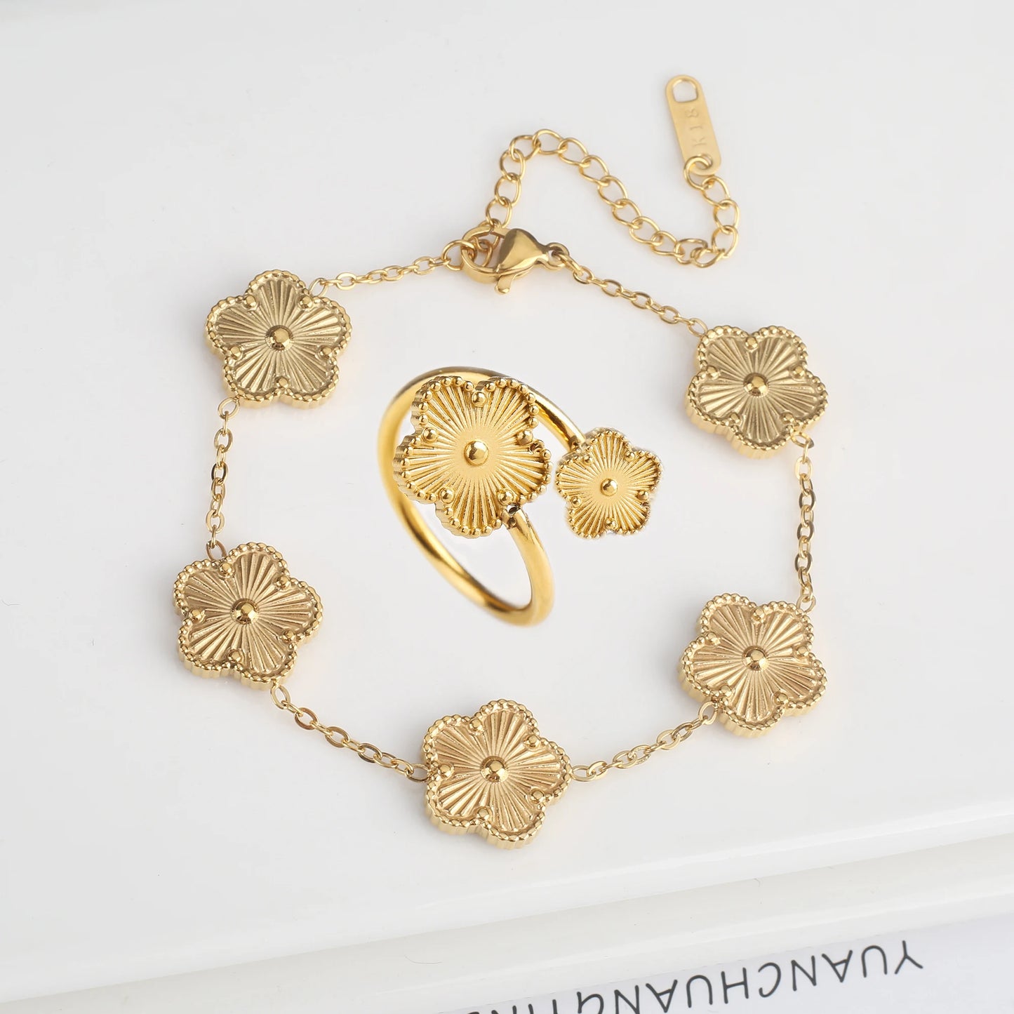 Luxury Stainless Steel Five Leaf Flower Jewelry Set for Women Featuring Bracelet Necklace Earrings and Rings