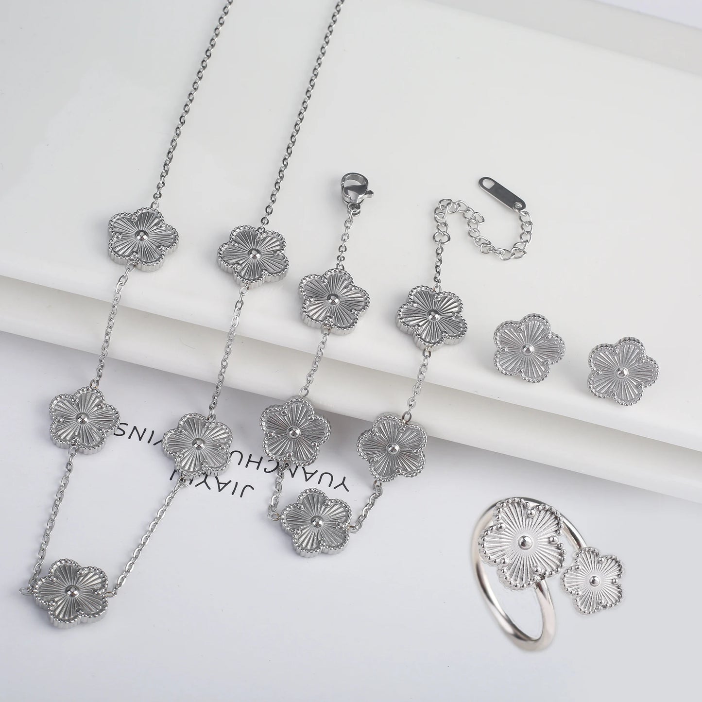 Luxury Stainless Steel Five Leaf Flower Jewelry Set for Women Featuring Bracelet Necklace Earrings and Rings