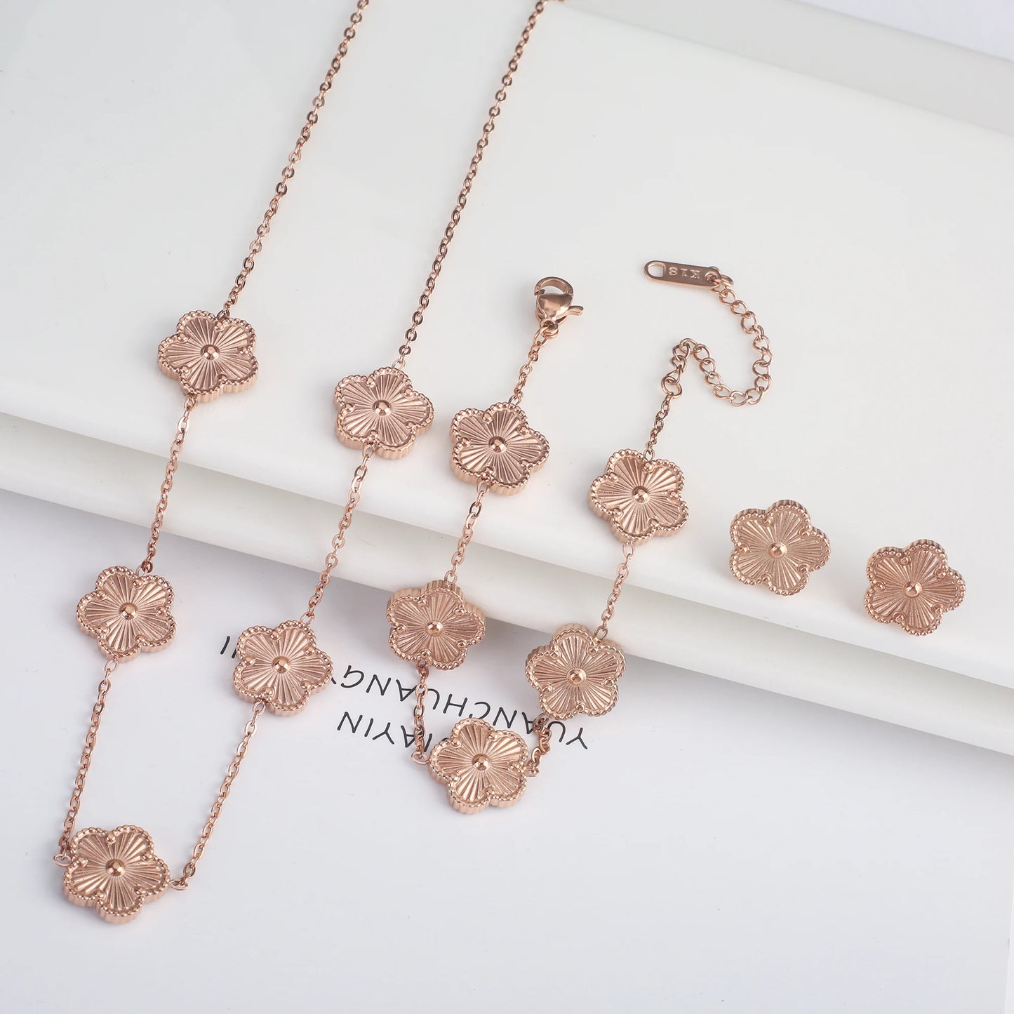 Luxury Stainless Steel Five Leaf Flower Jewelry Set for Women Featuring Bracelet Necklace Earrings and Rings