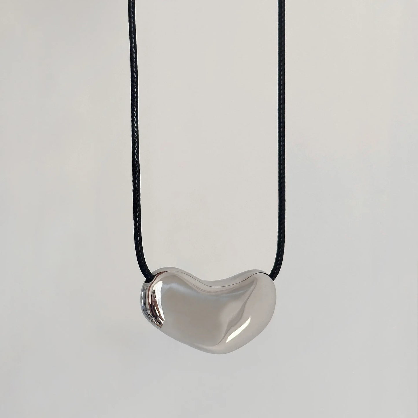 Elegant Heart Shaped Stainless Steel Pendant Necklace with Black Leather Choker for Women