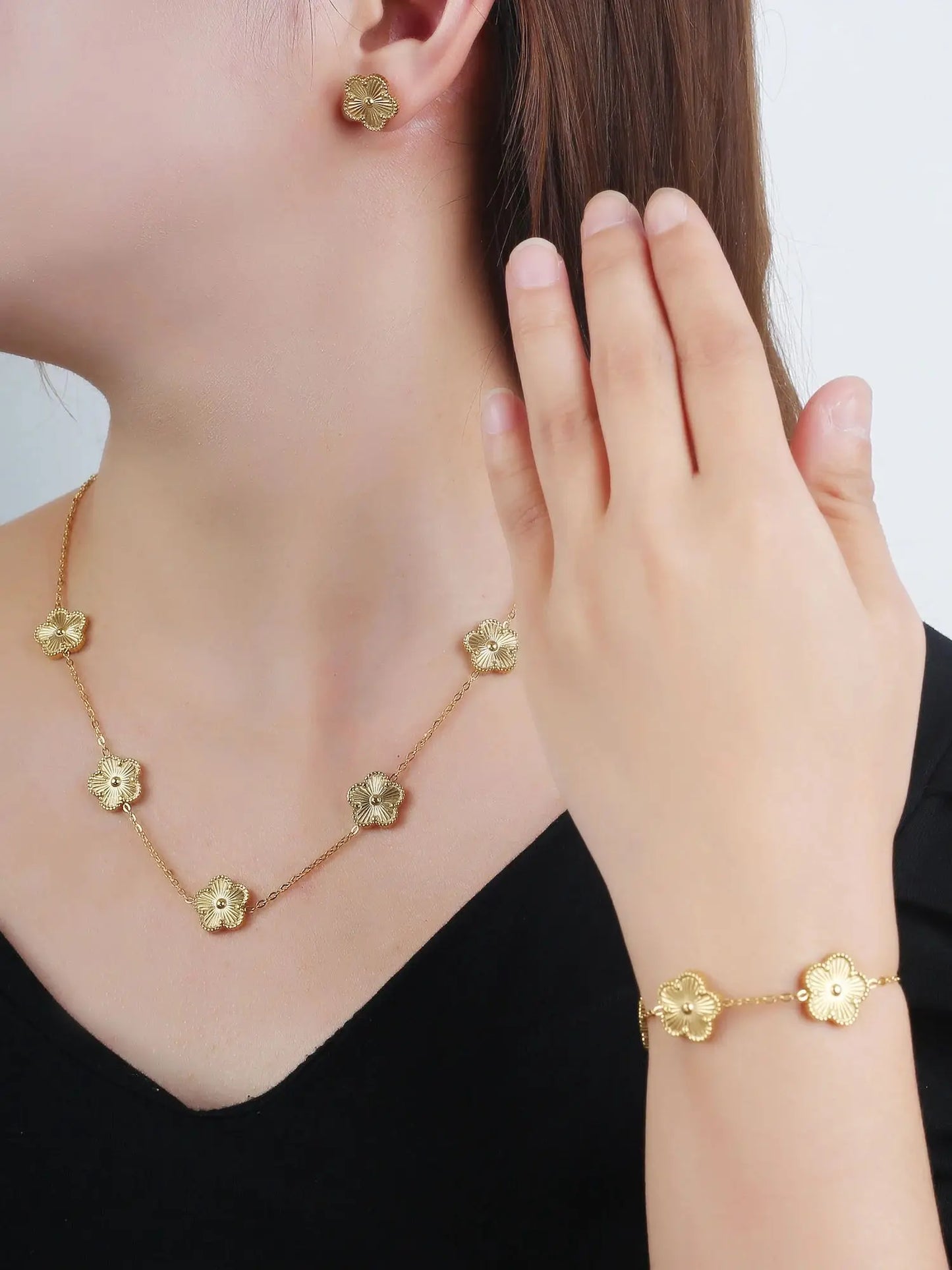 Luxury Stainless Steel Five Leaf Flower Jewelry Set for Women Featuring Bracelet Necklace Earrings and Rings