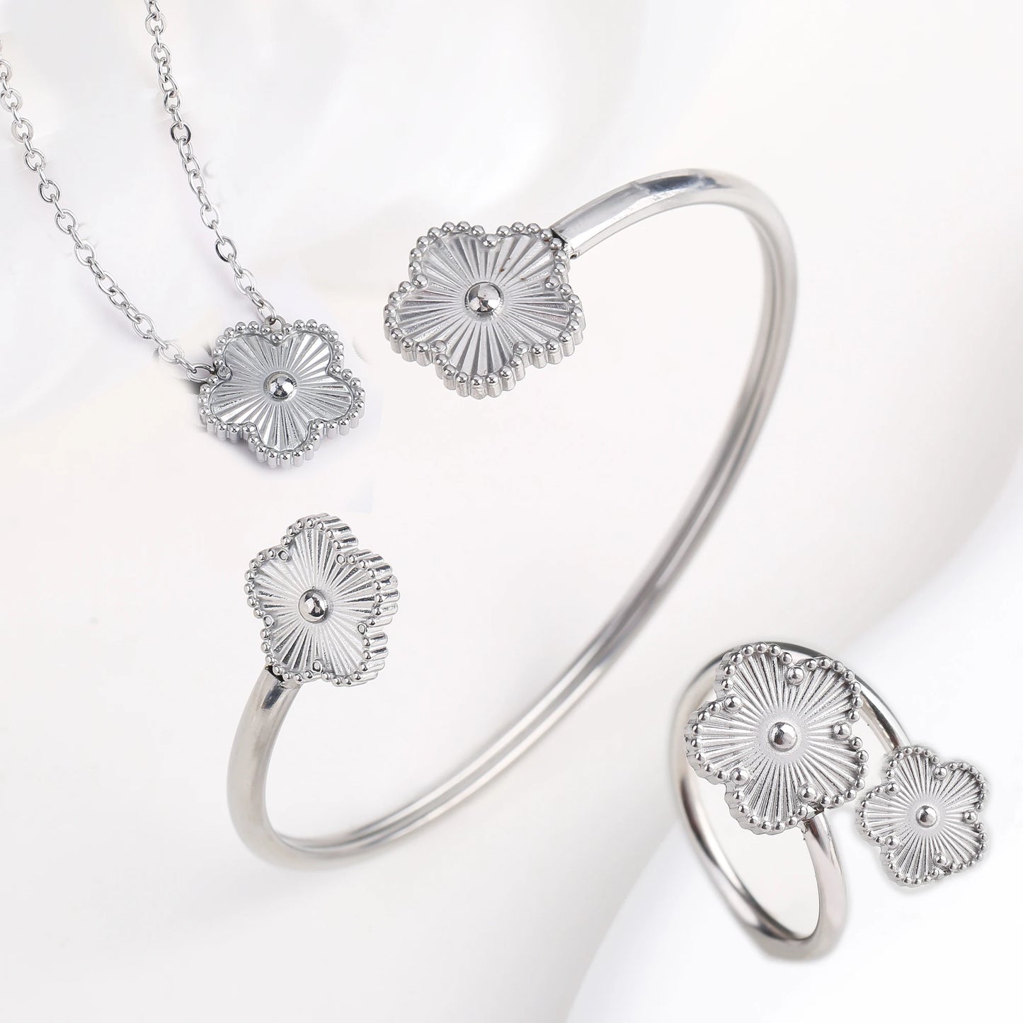 Luxury Stainless Steel Five Leaf Flower Jewelry Set for Women Featuring Bracelet Necklace Earrings and Rings