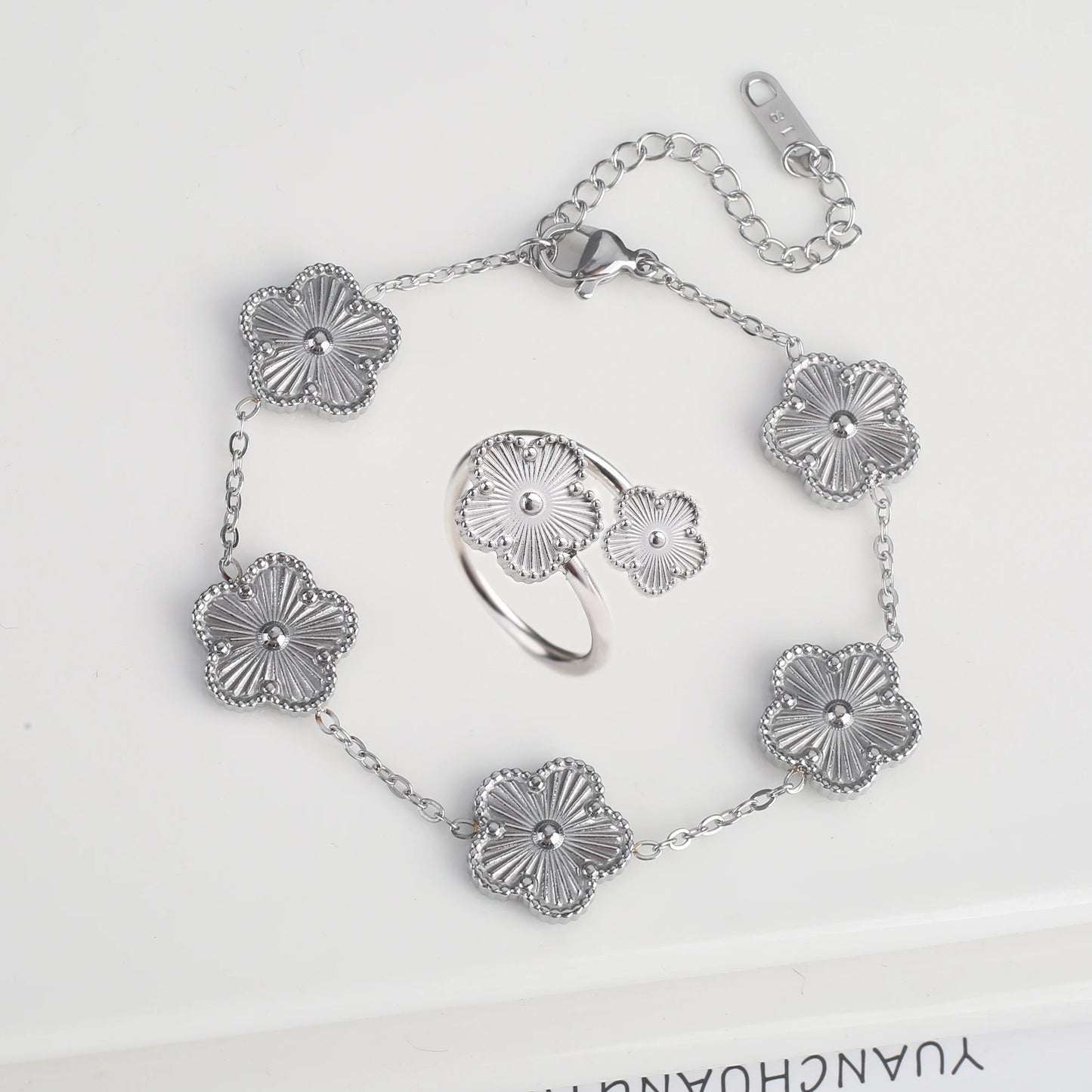 Luxury Stainless Steel Five Leaf Flower Jewelry Set for Women Featuring Bracelet Necklace Earrings and Rings