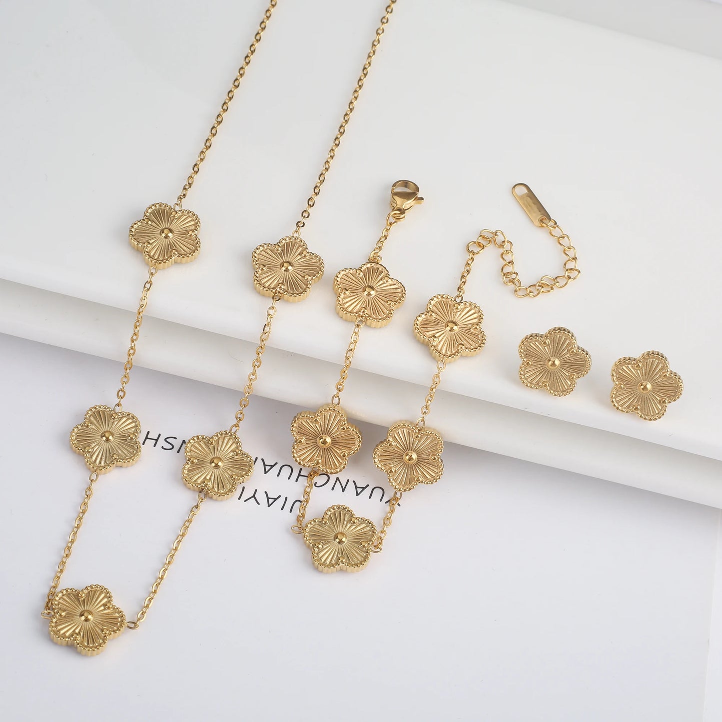 Luxury Stainless Steel Five Leaf Flower Jewelry Set for Women Featuring Bracelet Necklace Earrings and Rings
