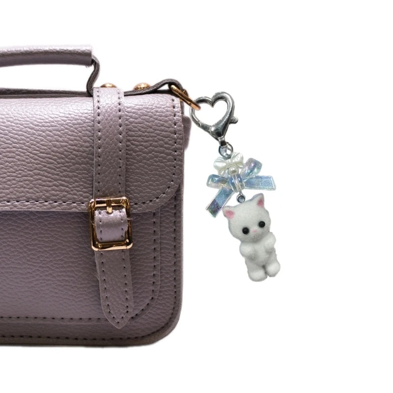 Charming Animal Flocking Keychain with Bowknot Pendant for Women