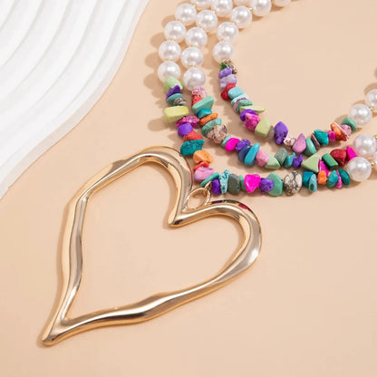 Elegant Gothic Love Heart Pendant Choker Necklace for Women with Multilayer Imitation Pearl Chain