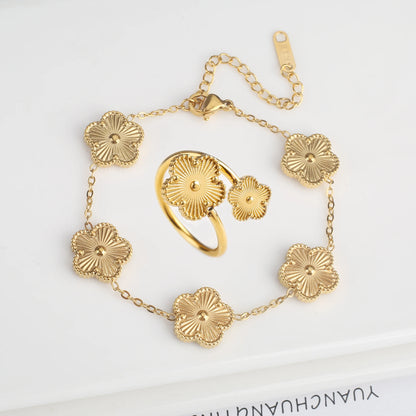 Luxury Stainless Steel Five Leaf Flower Jewelry Set for Women Featuring Bracelet Necklace Earrings and Rings