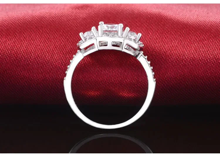 Elegant Silver Designer Engagement Ring with Triple Zircon Stones for Women