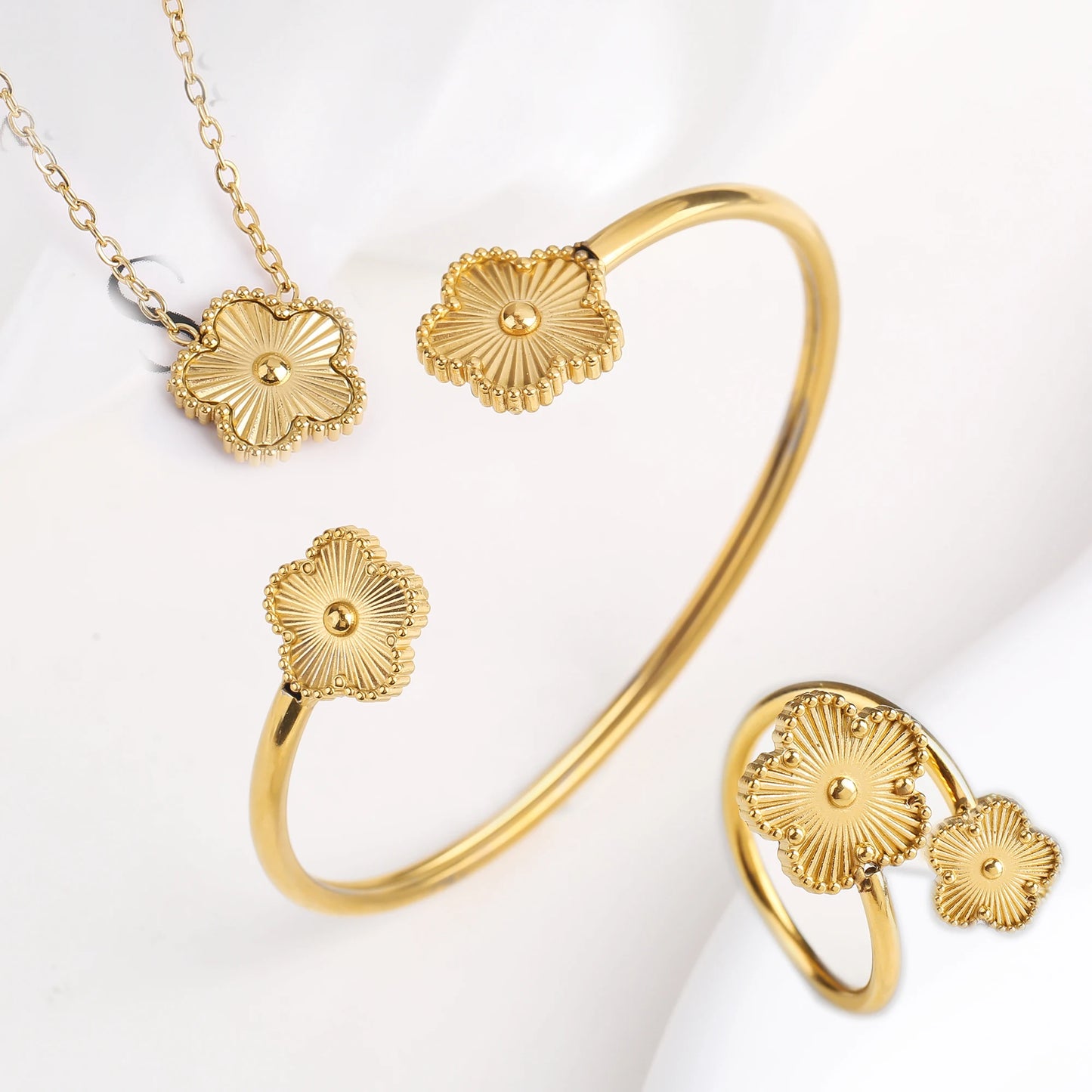 Luxury Stainless Steel Five Leaf Flower Jewelry Set for Women Featuring Bracelet Necklace Earrings and Rings