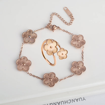 Luxury Stainless Steel Five Leaf Flower Jewelry Set for Women Featuring Bracelet Necklace Earrings and Rings