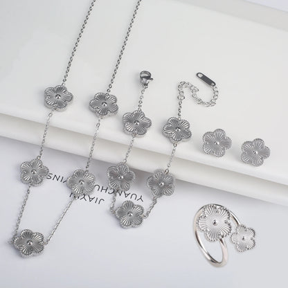 Luxury Stainless Steel Five Leaf Flower Jewelry Set for Women Featuring Bracelet Necklace Earrings and Rings