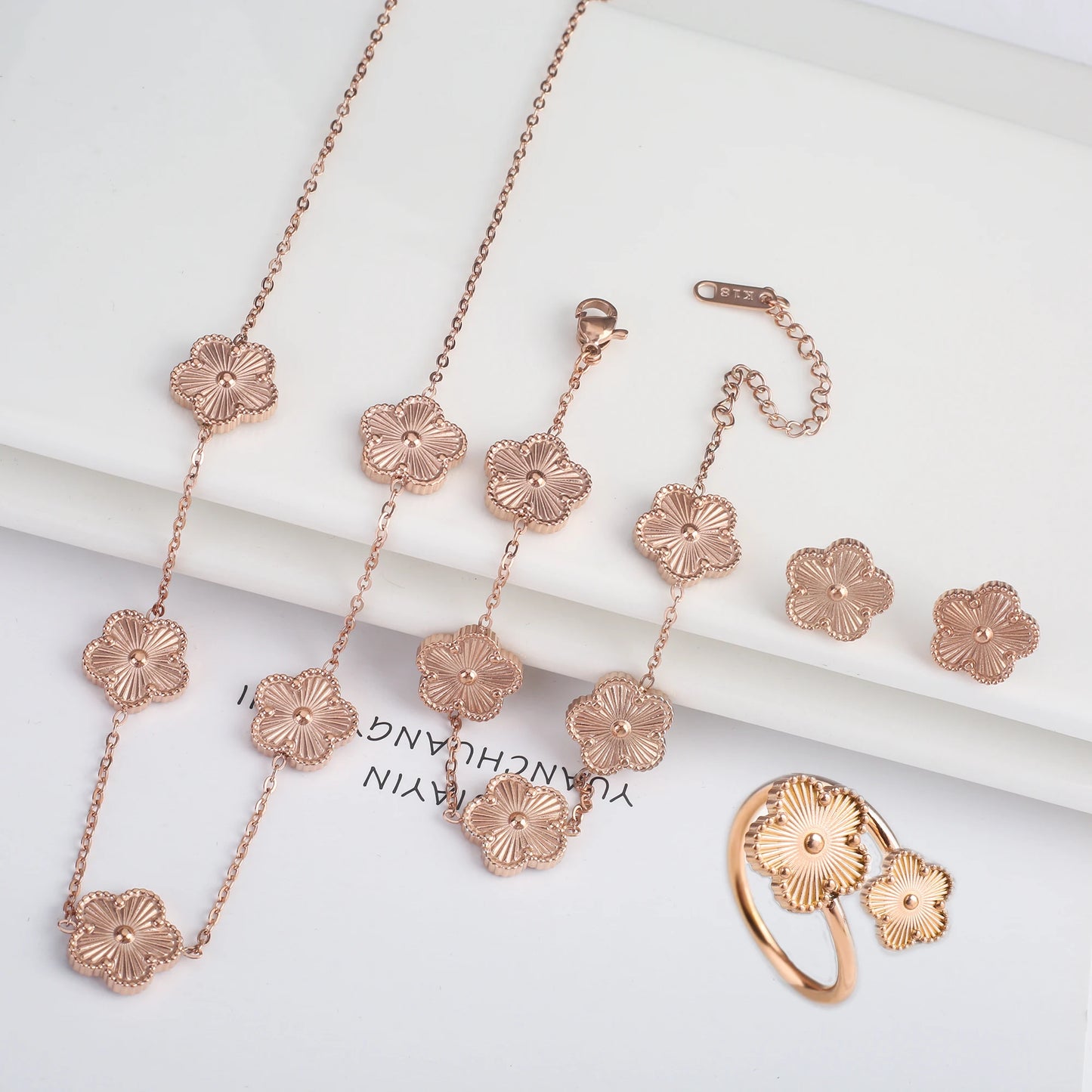 Luxury Stainless Steel Five Leaf Flower Jewelry Set for Women Featuring Bracelet Necklace Earrings and Rings