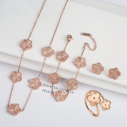 Luxury Stainless Steel Five Leaf Flower Jewelry Set for Women Featuring Bracelet Necklace Earrings and Rings