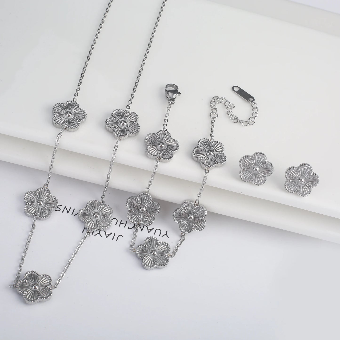 Luxury Stainless Steel Five Leaf Flower Jewelry Set for Women Featuring Bracelet Necklace Earrings and Rings