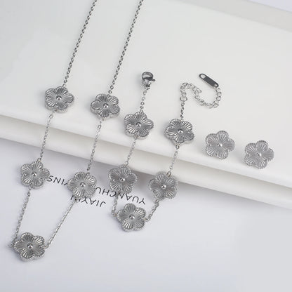 Luxury Stainless Steel Five Leaf Flower Jewelry Set for Women Featuring Bracelet Necklace Earrings and Rings