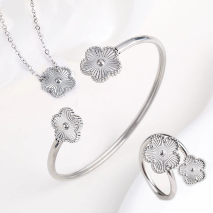 Luxury Stainless Steel Five Leaf Flower Jewelry Set for Women Featuring Bracelet Necklace Earrings and Rings