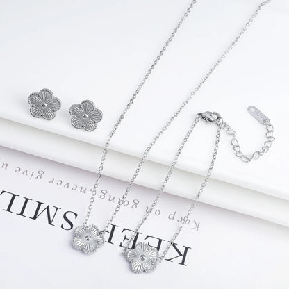 Luxury Stainless Steel Five Leaf Flower Jewelry Set for Women Featuring Bracelet Necklace Earrings and Rings