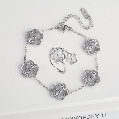 Luxury Stainless Steel Five Leaf Flower Jewelry Set for Women Featuring Bracelet Necklace Earrings and Rings