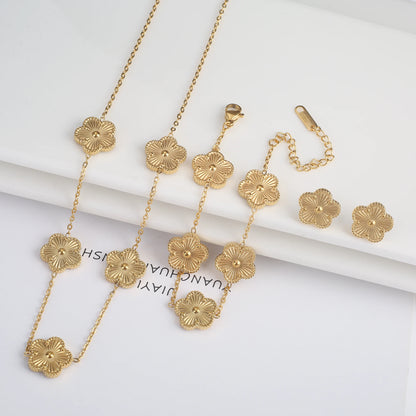 Luxury Stainless Steel Five Leaf Flower Jewelry Set for Women Featuring Bracelet Necklace Earrings and Rings
