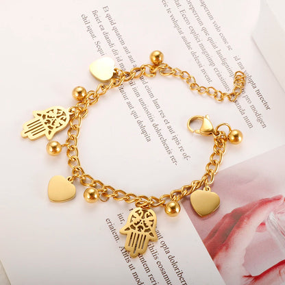 Trendy Gold Plated Stainless Steel Palm Heart Bracelet for Women with Cuban Link Chain and Round Ball Design